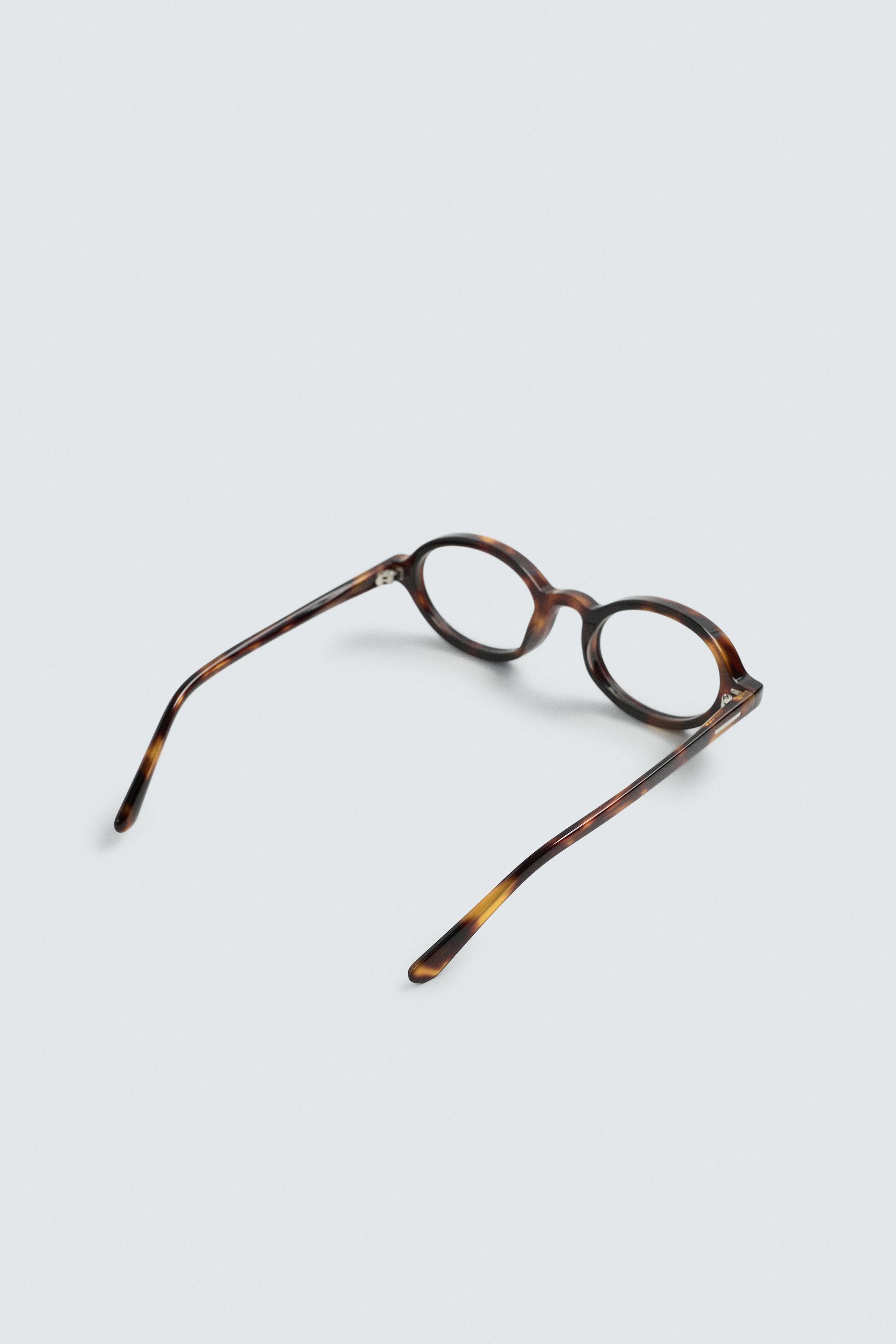 TORTOISESHELL EFFECT OVAL SUNGLASSES